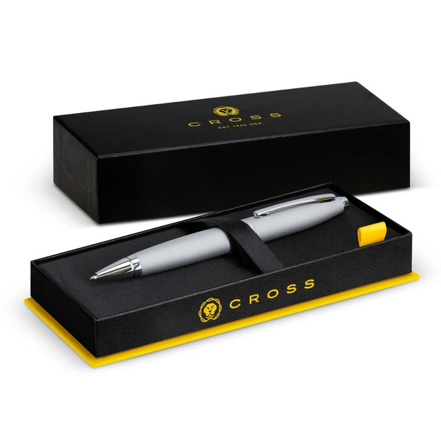 A silver ballpoint pen in a presentation box, featuring a logo and a yellow interior. A silver ballpoint pen in a presentation box, featuring a logo and a yellow interior.