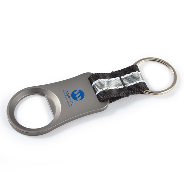 A drink bottle opener in silver metal with a black fabric handle and a ring for keychain attachment.