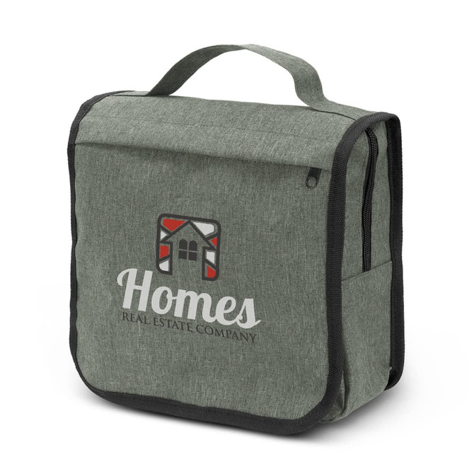 A green toiletry bag with a fold-over flap, featuring a logo on the front and side zippered pockets.