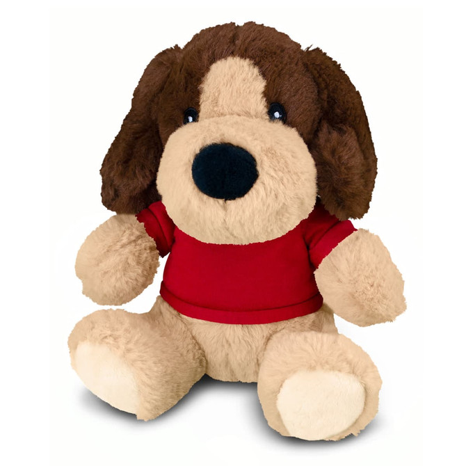 A plush dog toy with brown and cream fur, wearing a red shirt and sitting upright. It has large, expressive eyes.