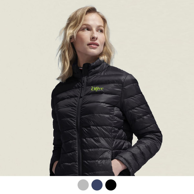A woman is wearing a black puffer jacket with a logo, featuring a stylish, fitted design.