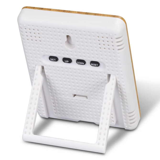 A bamboo and white weather station with buttons for setting and adjusting, featuring a foldable stand.