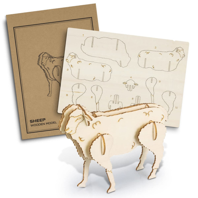 A wooden sheep model in light wood finish, alongside assembly instructions and packaging.
