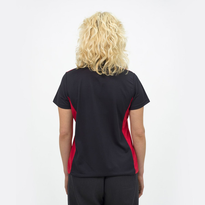 A women's polo shirt in navy blue with red side panels, featuring a small logo on the back.