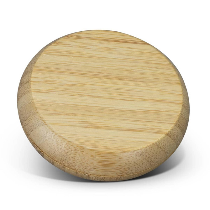 A round bamboo mirror with a smooth surface, showcasing its natural wooden texture and colour.