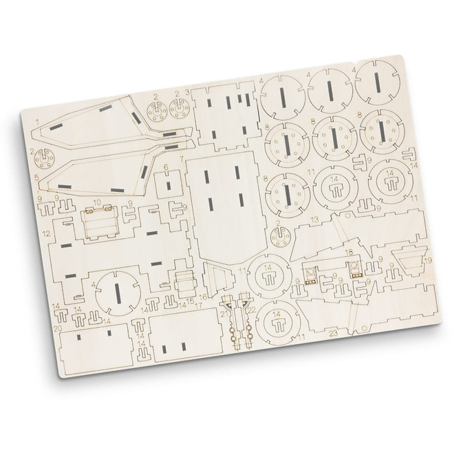 A wooden model kit featuring various pieces for constructing a mining truck, in light beige tones.