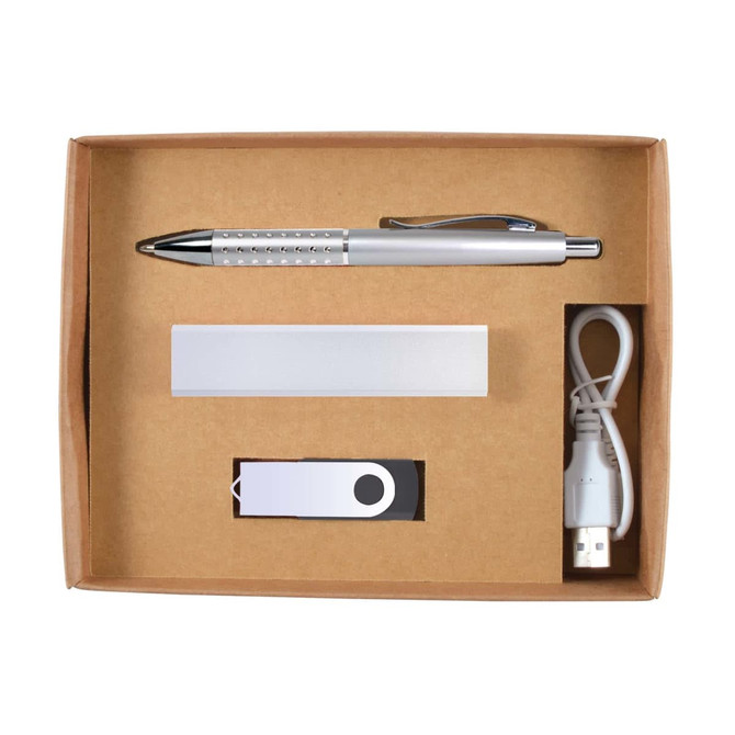 A cardboard gift set containing a silver pen, USB drive, power bank, and charging cable.