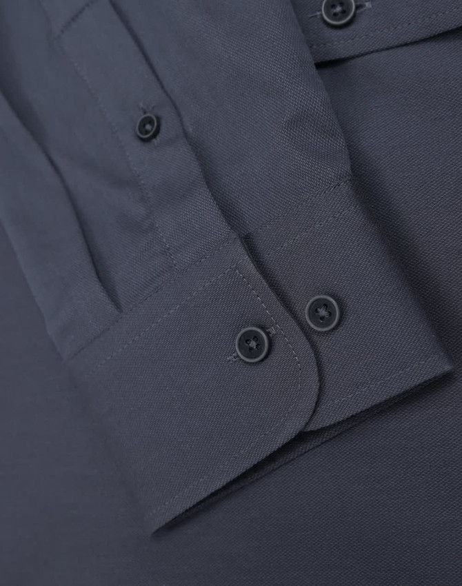 A grey men's smart casual cotton blend long sleeve shirt featuring button-up cuffs and a structured collar.