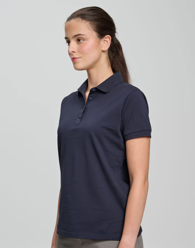 A navy ultrafine cotton pique polo with a collared neckline, displayed on a model. The shirt has a logo on it.