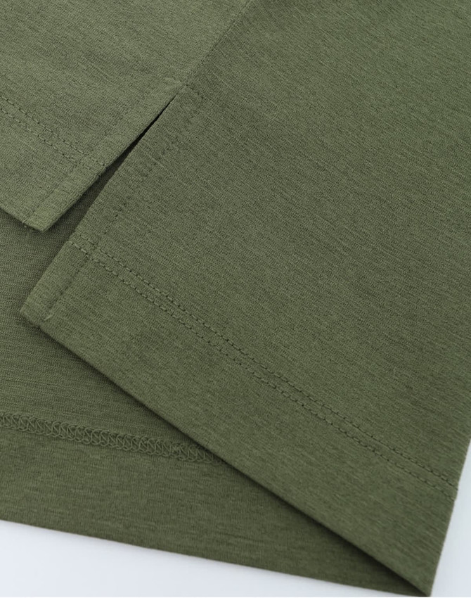 An olive green men's polo made from high-performance graphene fabric, featuring smooth seams and a modern design.
