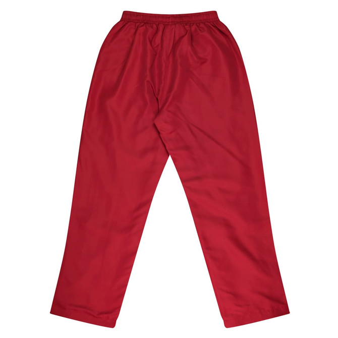 A pair of kids' track pants in a solid maroon colour, featuring an elasticated waistband and a simple design.
