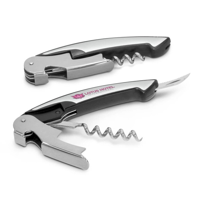 A drink bottle opener featuring a black handle with silver metal components, including a corkscrew and knife. It has branding on the handle.
