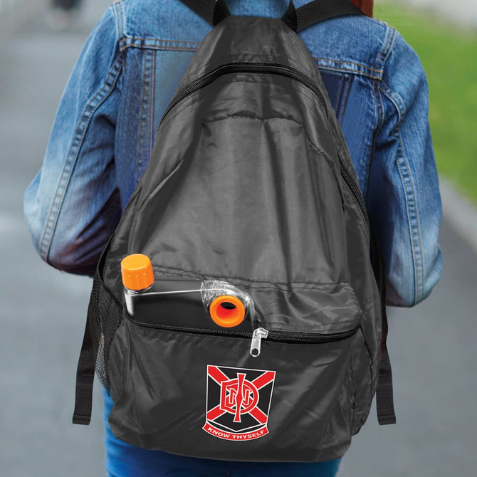 A black backpack with a logo and a drink bottle tucked into the front pocket, carried by a person wearing a denim jacket.
