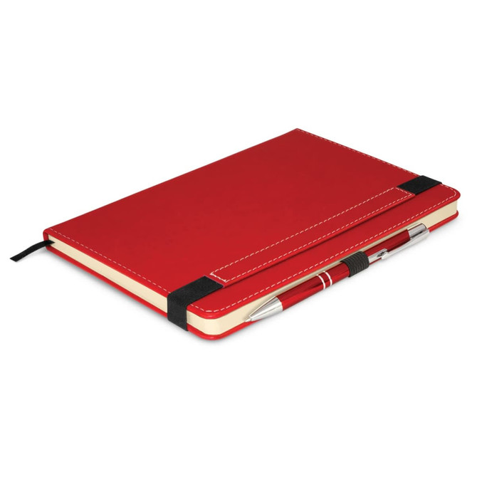 A red notebook with a pen secured on the side, featuring a black elastic band.