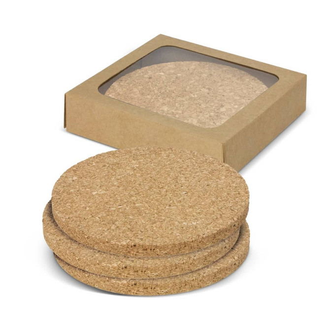 A set of four round cork coasters in a cardboard box, featuring a natural, light brown colour.