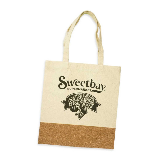 A cream-coloured tote bag with a cork bottom and a logo on the front.