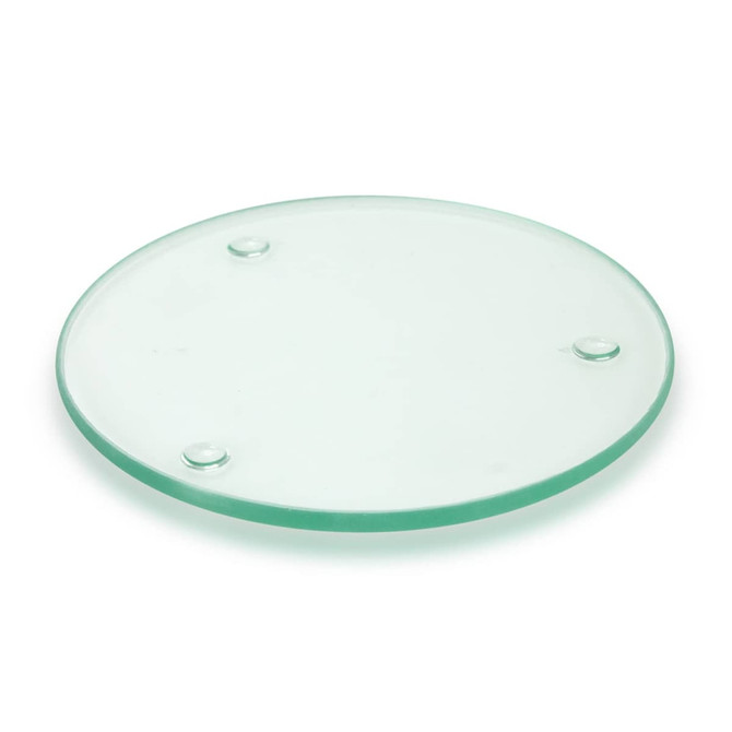 A round glass coaster with a frosted finish and three small rubber feet on the underside.