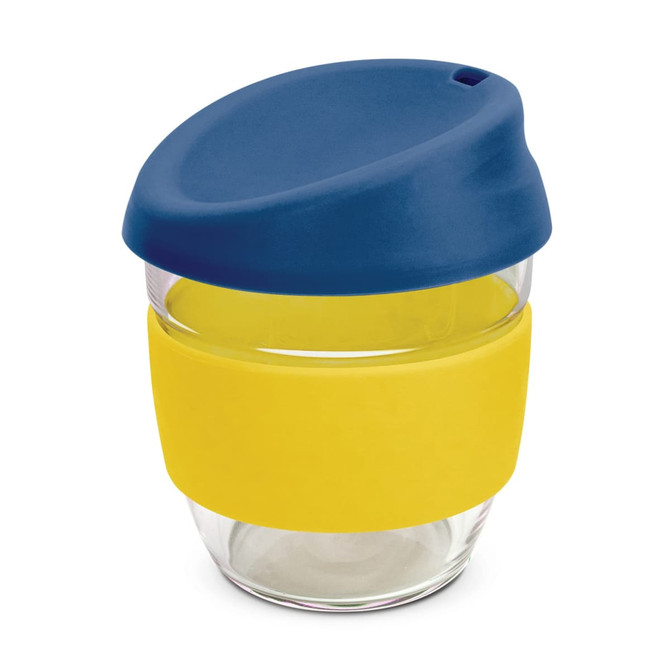 A drink bottle featuring a clear borosilicate glass body with a blue lid and a yellow silicone band.