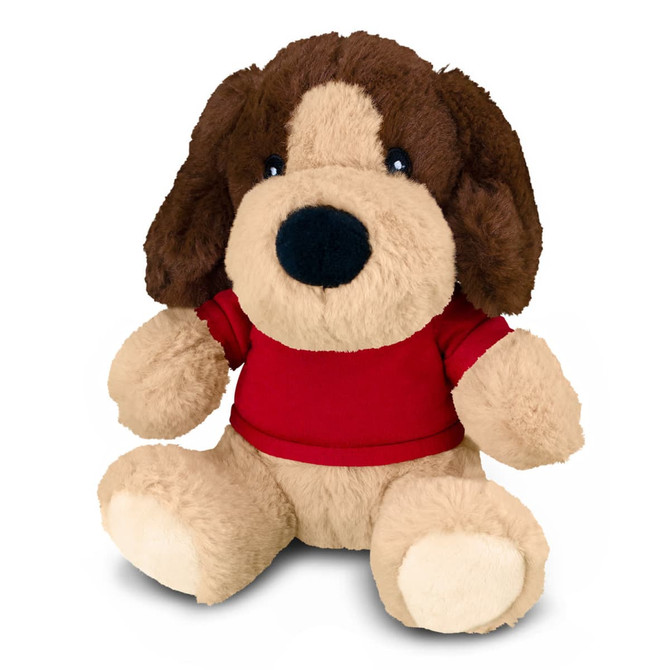 A plush dog toy with brown and beige fur, wearing a red t-shirt, sitting in a playful position.