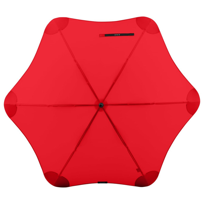 A red umbrella with a unique star shape, featuring a central button and a handle, also displaying a logo.