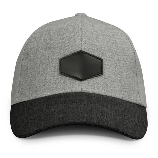 A grey cap with a dark grey peak, featuring a leather patch on the front.