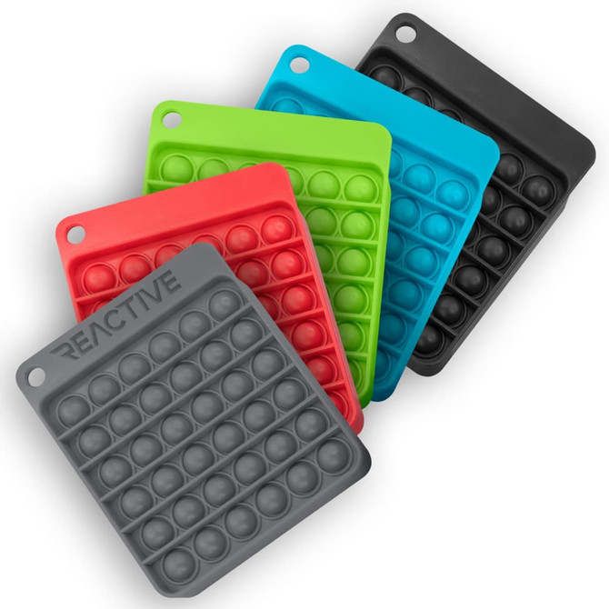 A set of five Pop Bubble Boards in black, green, red, and blue, featuring various bubble patterns. Each board has a loop for hanging.