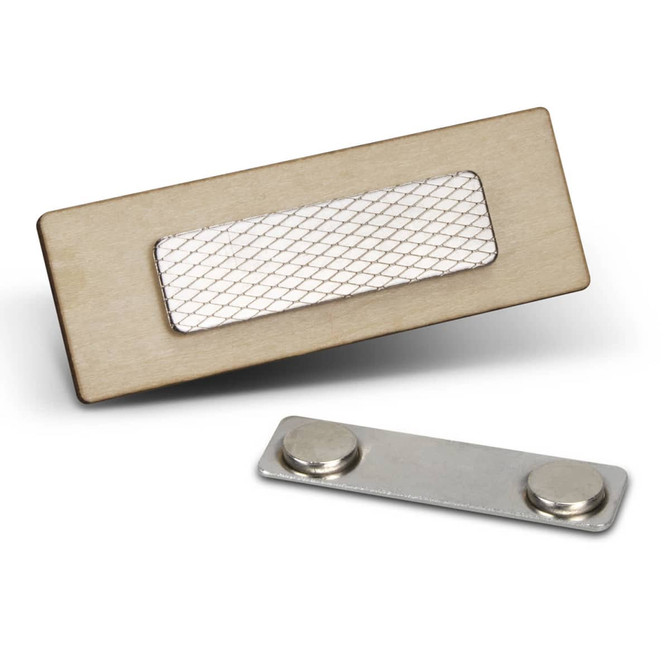 A wooden badge with a mesh window, featuring a metallic back with two magnets. The badge is light-coloured.