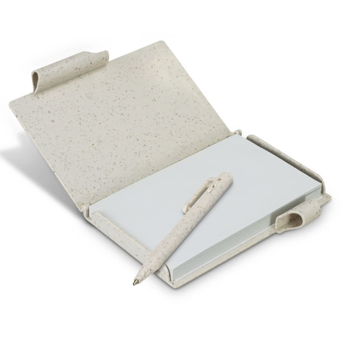 A natural-coloured notebook with a speckled design, featuring a matching pen attached.