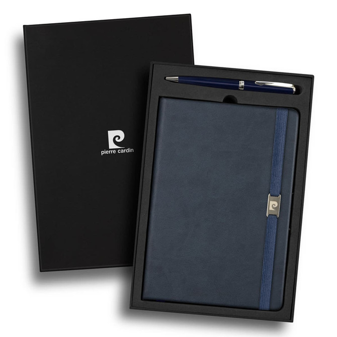 A navy notebook with a clasp and a silver pen, presented in a sleek black gift box with a logo.