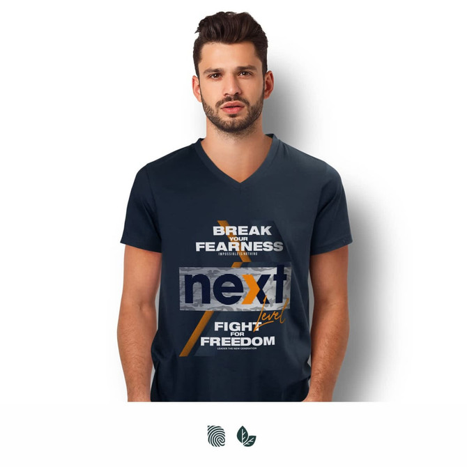 A man wearing a navy blue V-neck T-shirt featuring a graphic design and a logo.