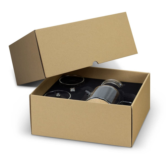 A gift box containing a tea set with a clear teapot, two cups, and a black interior. The box is plain brown with a lid.