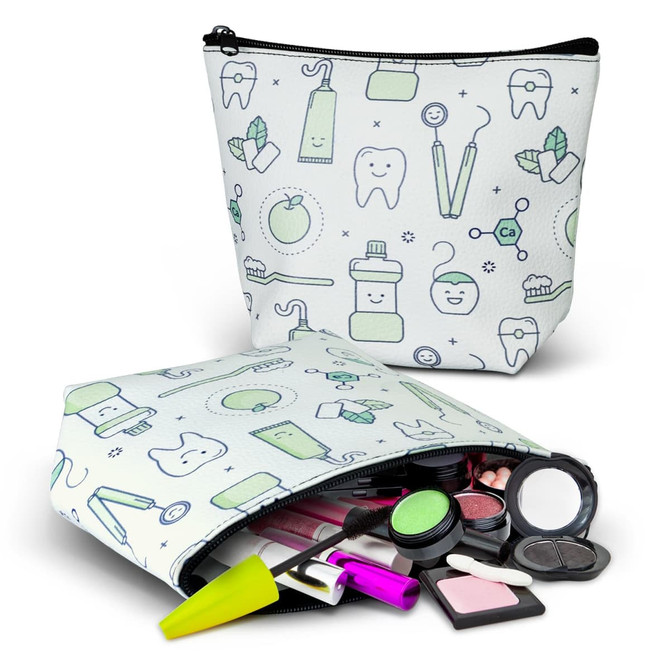A small cosmetic bag in white featuring green dental-themed illustrations, filled with various makeup products.