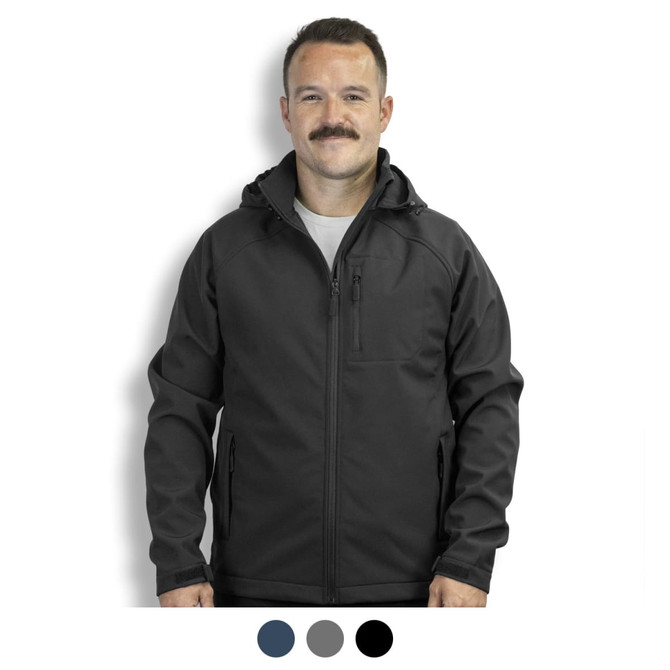 A man is wearing a black soft shell jacket with a hood. The jacket features a logo on the front.