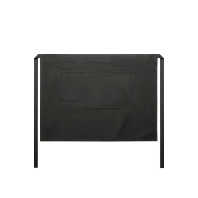 A black half apron featuring a large pocket and fabric ties at the waist. It has a minimalist design with no additional markings.