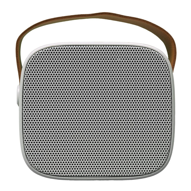 A compact speaker with a square design and mesh front, featuring a brown carrying strap.