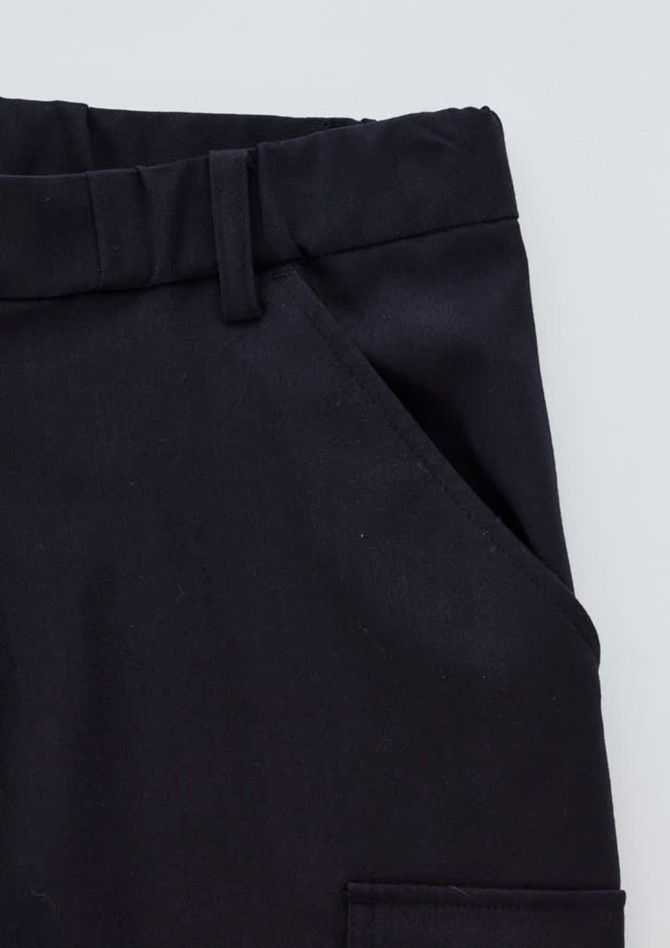 A close-up of black men's comfort waist cargo pants featuring side pockets and a sturdy waistband.