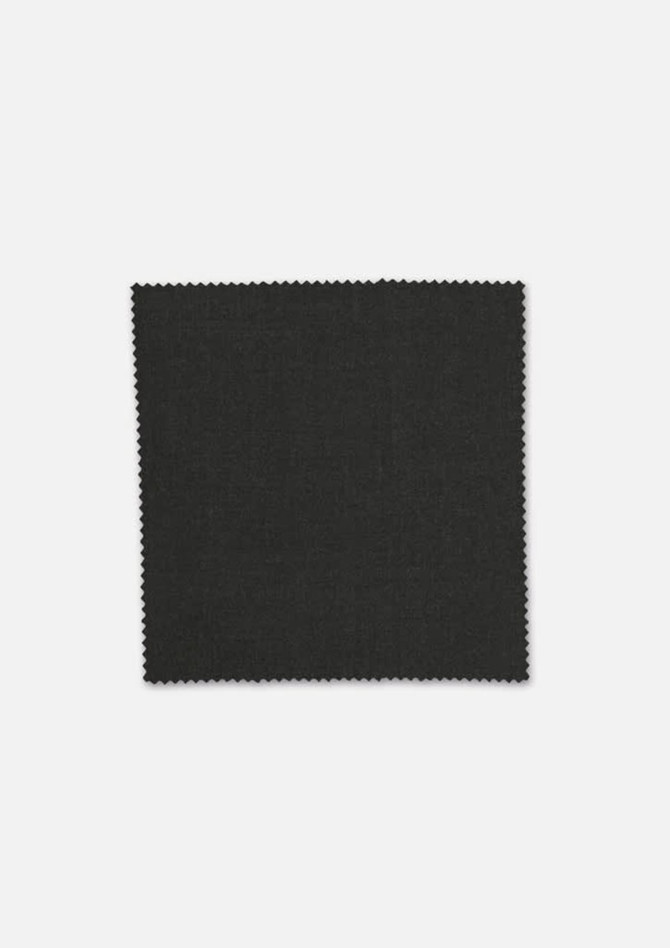A swatch of dark green fabric showcasing a textured weave, suitable for suiting or jackets.