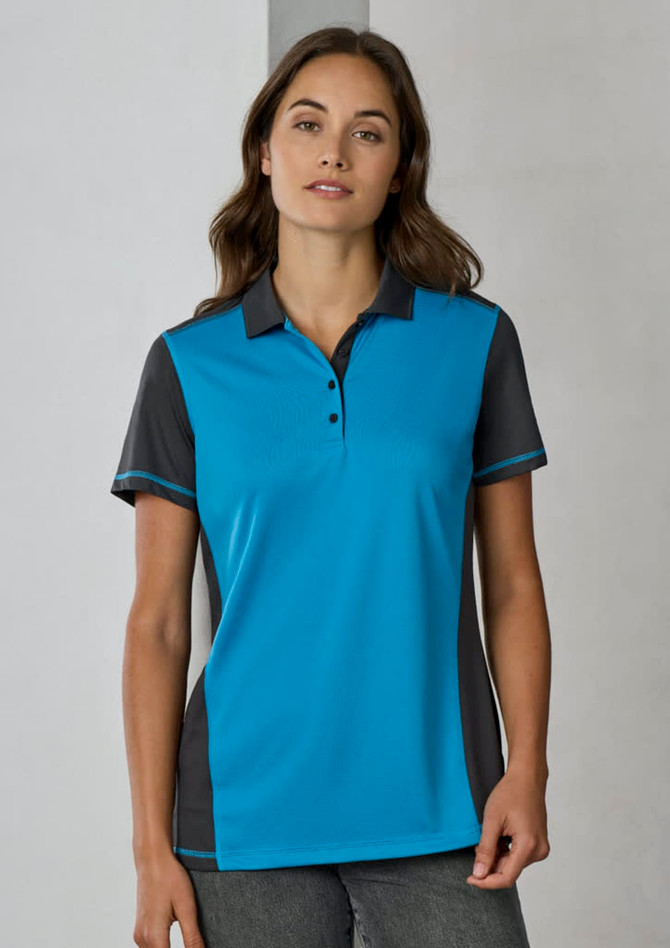 A women's short sleeve polo shirt in vibrant blue and black, featuring a collar and buttons, with a logo present.