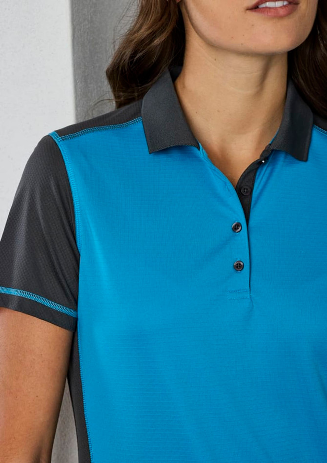 A women's short sleeve polo in blue with black accents and a three-button placket, featuring a logo on the chest.