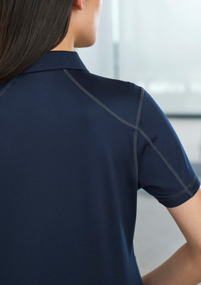 A navy short sleeve polo shirt featuring a subtle texture and stitching detail, designed for women.