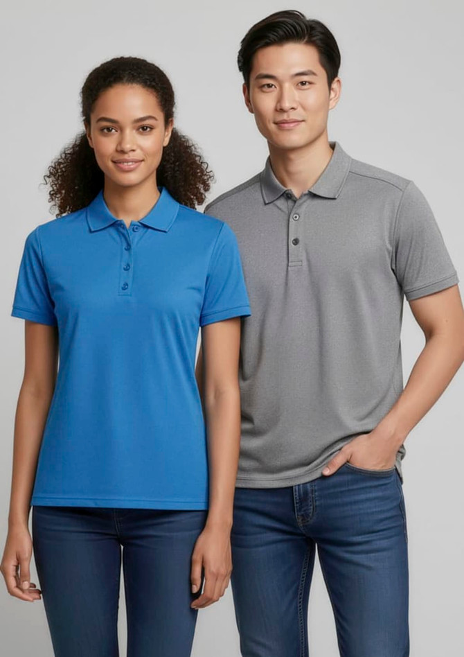 A blue women's short sleeve polo shirt and a grey men's short sleeve polo shirt, both featuring logos, displayed by models.