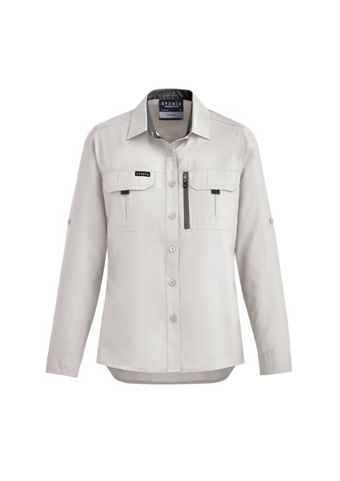 A light grey women's long sleeve button-up shirt with two front pockets and a zippered pocket. Styled for outdoor use.