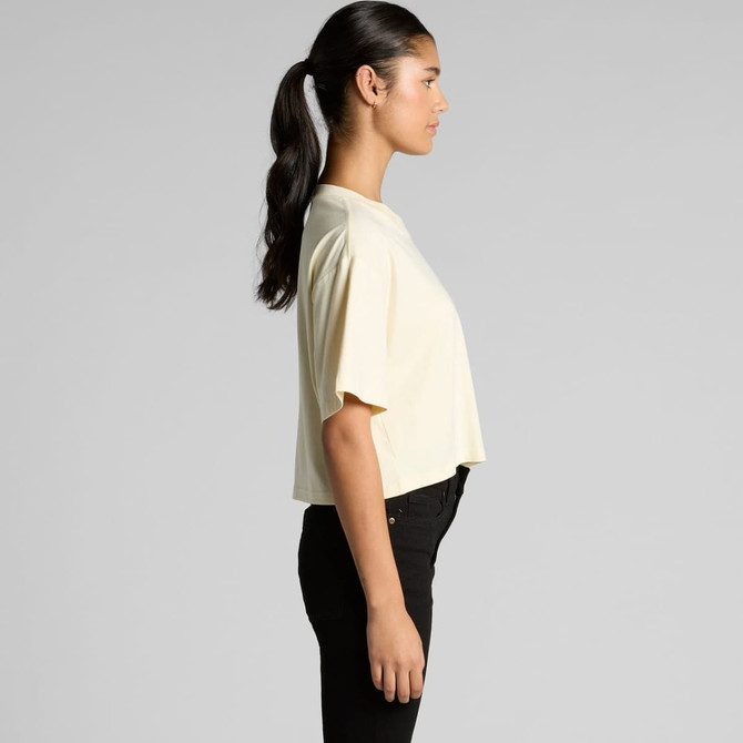 A side view of a cropped tee in pale yellow, featuring short sleeves and a relaxed fit.