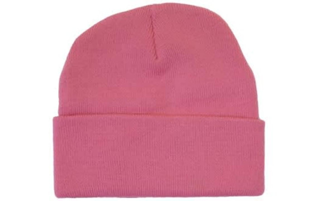 A pink acrylic beanie featuring a folded cuff. The product has a logo on it.