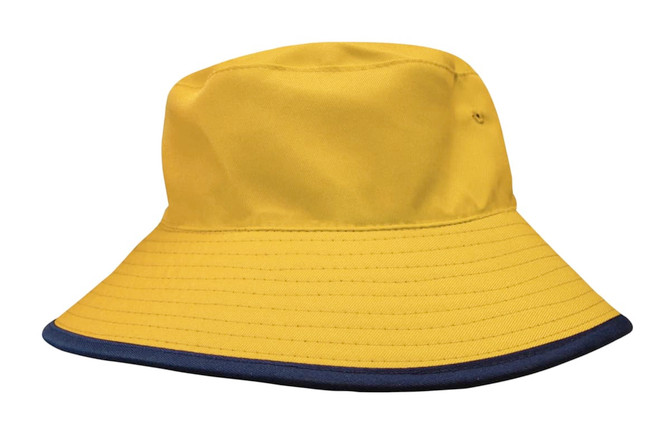 A reversible bucket hat in yellow with a navy blue brim and an attached branding logo.
