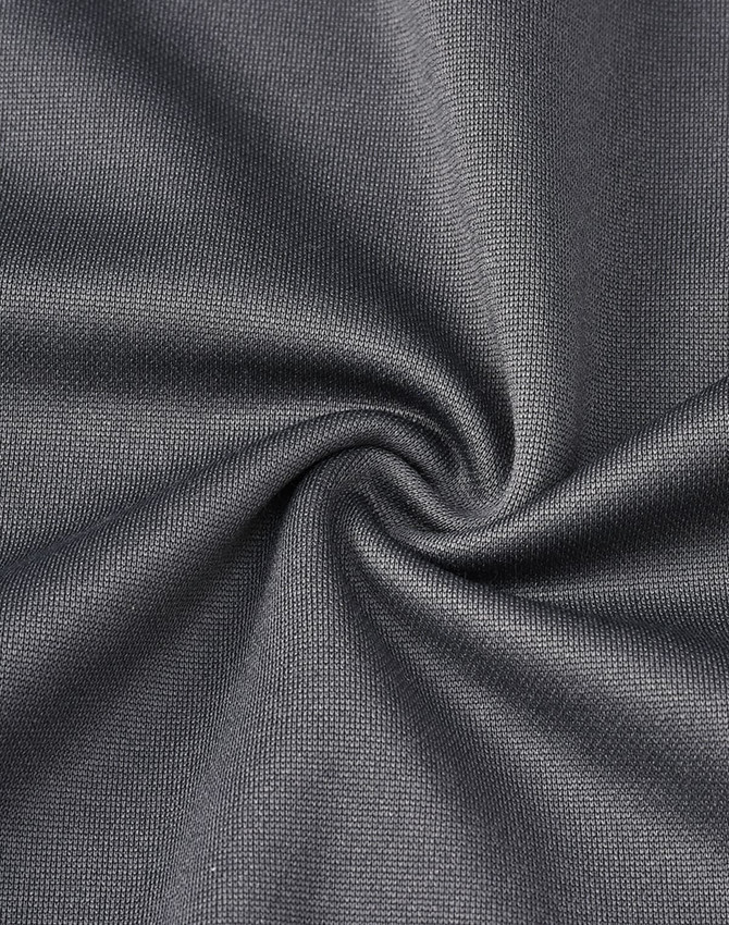 A close-up of dark grey fabric showcasing a smooth, textured surface, ideal for polo shirts.
