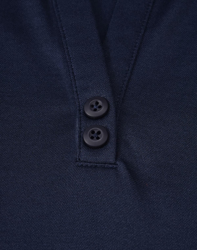 A navy polo shirt featuring a two-button placket and subtle textures, with a logo on the fabric.