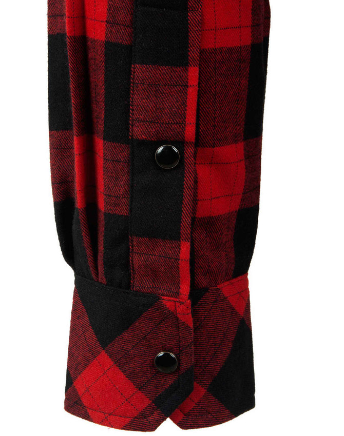A close-up of a unisex flannel shirt featuring a red and black plaid pattern with button details on the cuff.