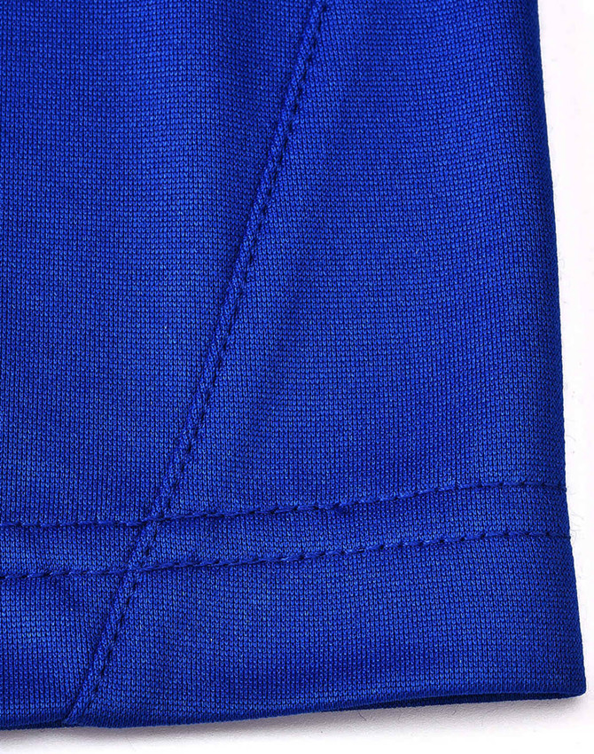 A close-up of a blue polo shirt featuring contrast stitching and a tag with a logo.