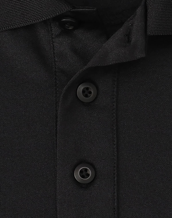 A close-up of a black polo shirt featuring a collar and three buttons, with subtle texture details.
